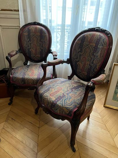 null Set of two armchairs and four chairs in molded and carved rosewood from the...