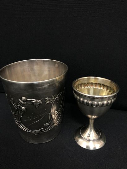 null LOT OF SILVER including :
Timbale with leafy decoration engraved "André", an...