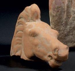 Fragment de statuette représentant une tête...