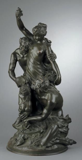 D'après CLODION Bacchante et satyres Groupe en bronze à patine brune. H. 53 cm