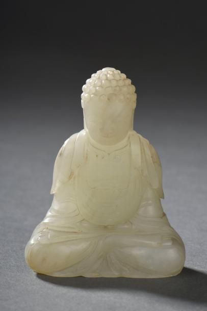 Statuette de Bouddha assis en jade céladon...
