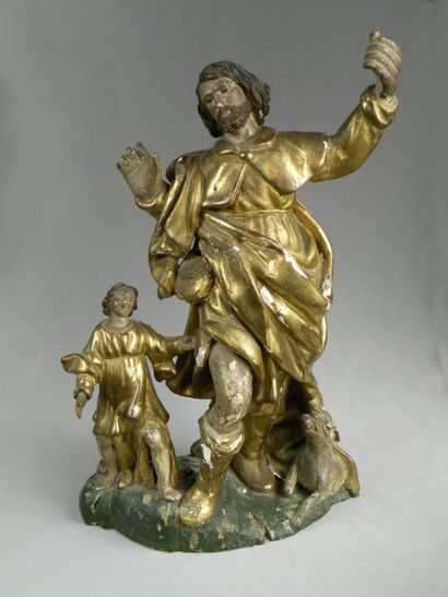 null Saint Roch, XVIIe siècle En bois sculpté, polychromé et doré. Debout avec à...