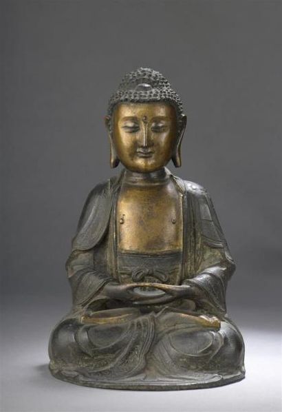 null STATUE DE BOUDDHA assis sur un lotus en bronze partiellement doré
Chine, époque...