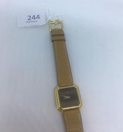 null Baume et Mercier. Bracelet-montre de dame, en or jaune 18K (750 ) cadran
octogonal,...