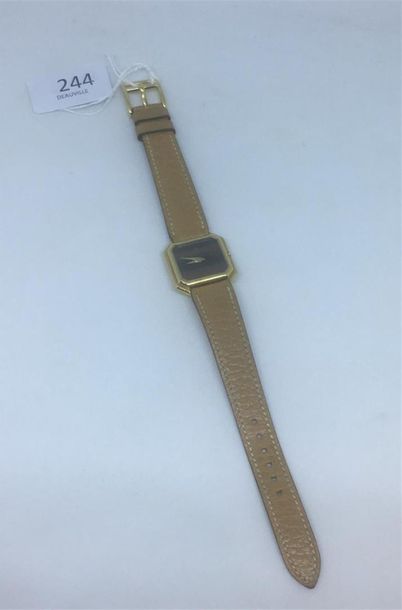null Baume et Mercier. Bracelet-montre de dame, en or jaune 18K (750 ) cadran
octogonal,...