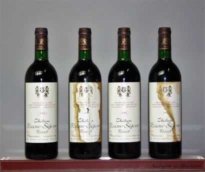 null 4 bouteilles 
CHÂTEAU BEAUSÉJOUR BÉCOT - 1er GCC St. Emilion 
1990 
Deux étiquettes...