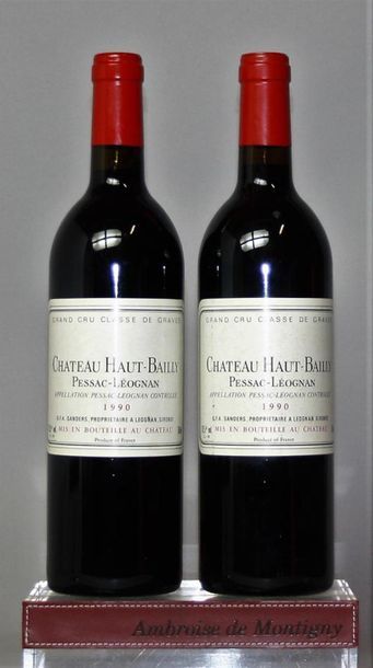 null 2 bouteilles 
CHÂTEAU HAUT BAILLY - GC Pessac Léognan 
1990 
Etiquettes légèrement...
