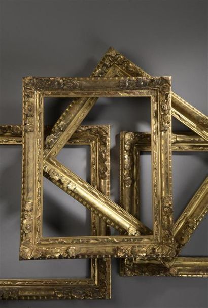 null Suite de quatre cadres en bois sculpté et doré d'époque Louis XIV
à décor de...