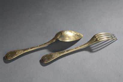 null Couverts en vermeil, Paris 1809-1819, orfèvre ML
La spatule ornée d'un écusson...