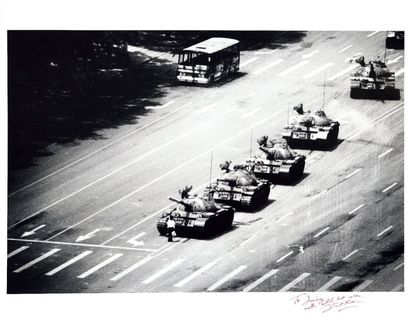 null Stuart Franklin (1956)

The Tank Man stopping the column of T59 tanks. 

Tiananmen...