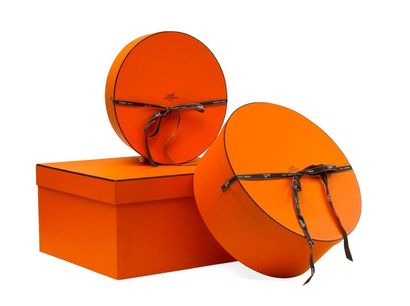 null HERMÈS Paris

Set of three empty orange boxes of the House, two oval and one...