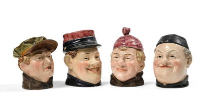 null Quatre pots à tabac anthropomorphes en céramique représentant des têtes d'hommes...