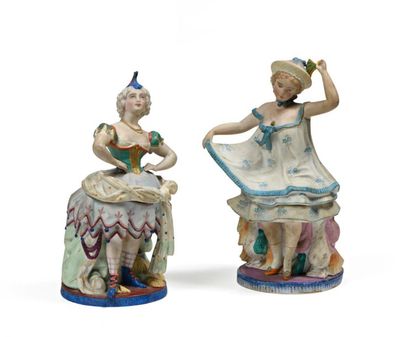 null PARIS
Deux figurines en biscuit polychrome représentant deux femmes du music-hall
Fin...
