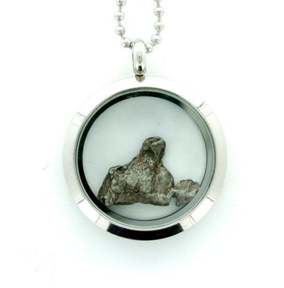 null Pendant medallion containing a meteorite that fell in Argentina more than 5,000...