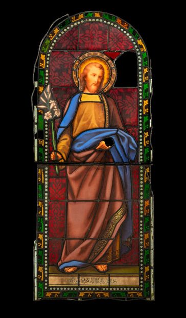 null Stained glass windows representing Saint Mary and Saint Joseph. 

End of the...