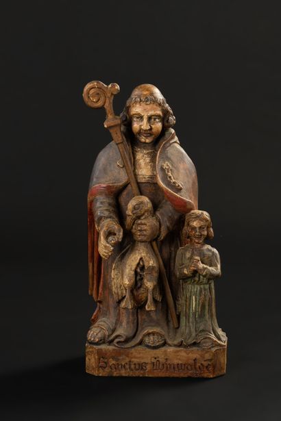 null Folk art group representing Saint Guenolé (goose and child) in carved and polychrome...