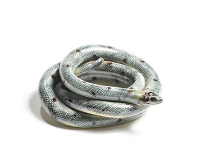 null Manufacture AVISSEAU attr. to

Coiled snake in glazed earth with polychrome...
