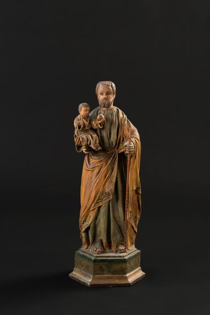 null Polychrome wooden figure of Saint Joseph and child on a base (secret drawer)...