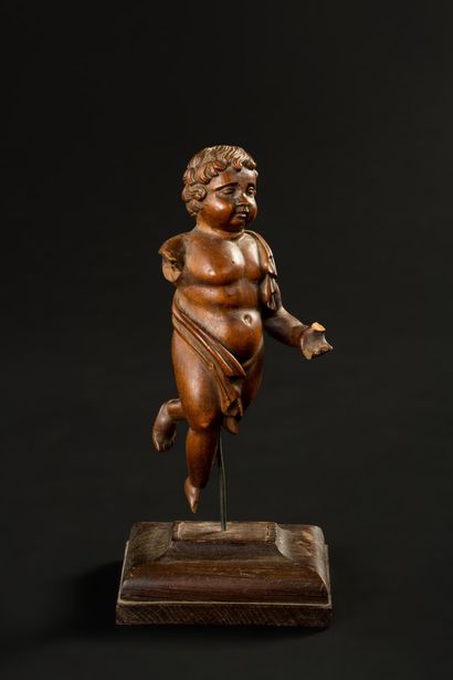 null Carved limewood putto on base 

Height 25 cm