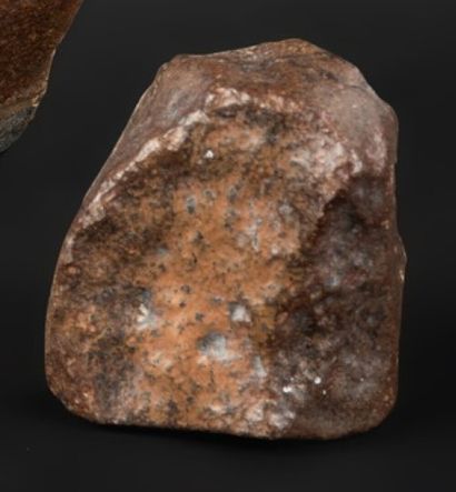 null Chondrite H meteorite discovered in the Atacama desert. A cut on one end reveals...