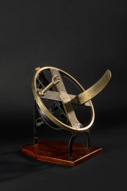 null Brass solar chronometer on a wrought iron base and a varnished wood stand

19th...