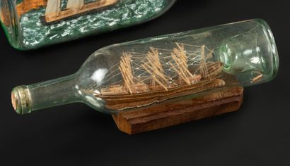 null 4 masts boat in a bottle. Cape Horn work as a souvenir. Ship damaged on the...