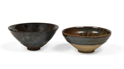 null JAPAN Two stoneware Chawan bowls for the tea ceremony, with an ochre-brown glaze,...