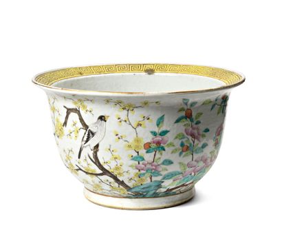 null CHINA

Large porcelain circular jardinière decorated on the outside with birds...