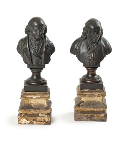 null A pair of chased and patinated bronze busts representing Benjamin Franklin and...