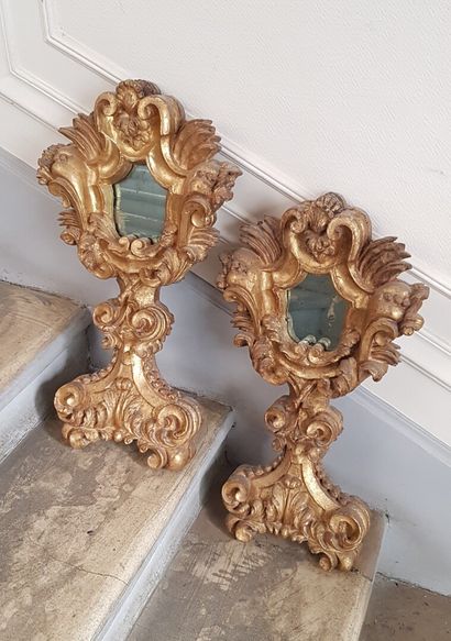 null Pair of gilded wood monstrosities decorated with foliage and scrolls (transformed...