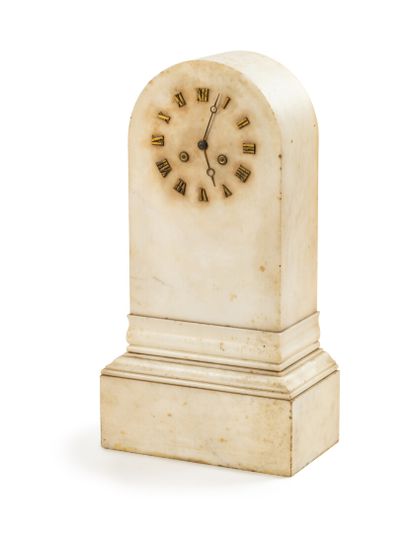 null A white marble clock with a moulded base and Roman numerals in relief. 

19th...