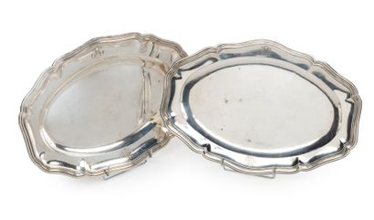 null Two oval silver dishes 

With filleted contours engraved on the rim with the...