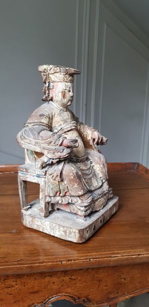 null CHINA

Wooden group carved in old polychrome and gold with a seated sage

Work...