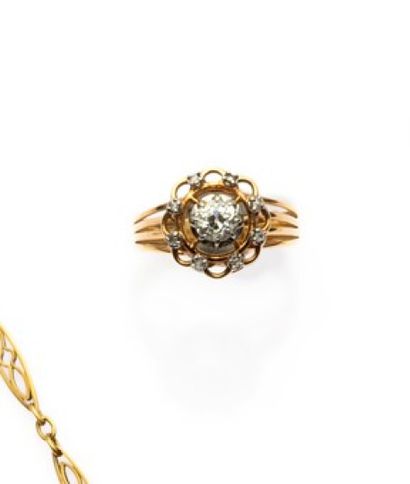 null Yellow gold 750MM and platinum ring centered with an old cut diamond weighing...