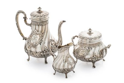 null Silver tea service

In the Louis XV style on four feet with leaf attachments,...