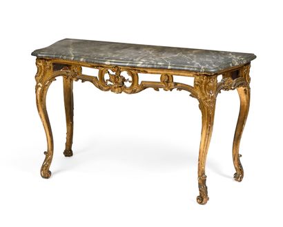 null A moulded, carved and gilded linden wood console; the openwork belt with leafy...