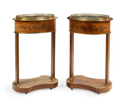 null A pair of mahogany and mahogany burl veneer planters, each resting on pilaster-like...