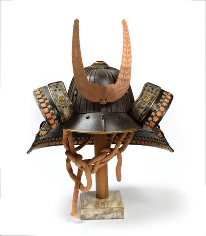 null Japanese helmet in patinated iron with 32 slats.

	Shikoro ko-manju, has 3 black...