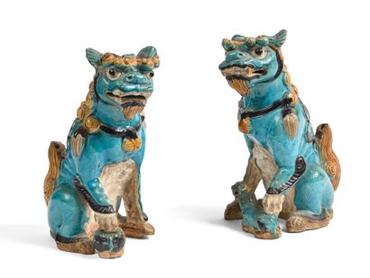 null CHINA

Pair of large figurines presenting a couple of Fo dogs, the female holding...