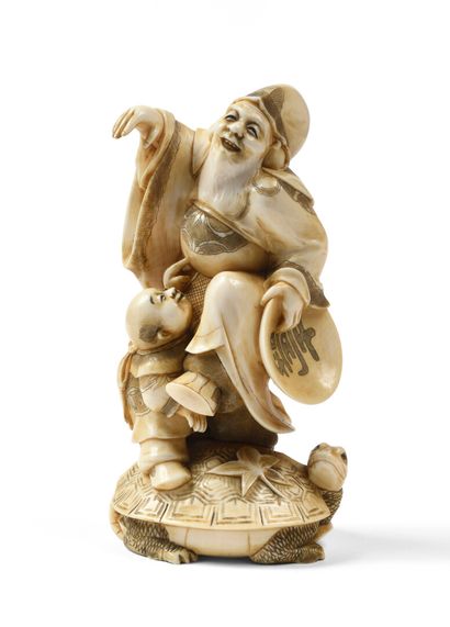 null JAPON Okimono en ivoire sculpté représentant un personnage et un enfant, juchés...