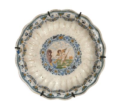 null MOUSTIERS

A round earthenware bowl with a polychrome mythological decoration...