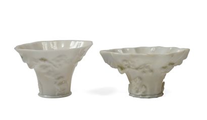 null CHINA Two white enamelled porcelain libation bowls in imitation of rhinoceros...