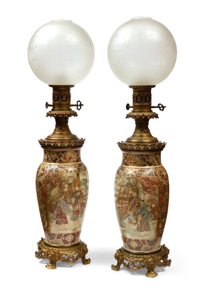 null JAPAN SATSUMA Pair of earthenware vases, mounted as oil lamps, with polychrome...