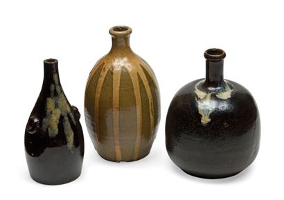 null JAPAN Three different ovoid sake bottles with brown, celadon and beige covers....