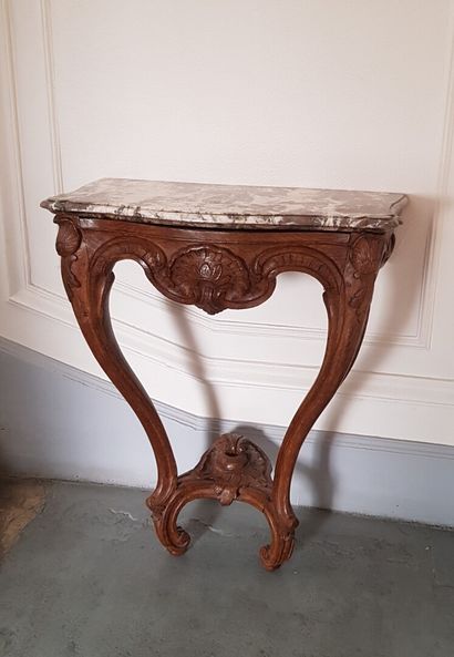 null Louis XV style console in natural wood with mouldings and carvings of shells...