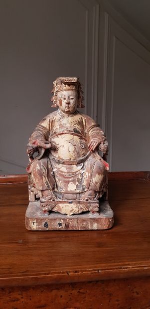 null CHINA

Wooden group carved in old polychrome and gold with a seated sage

Work...
