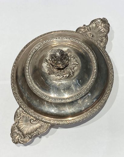 null Silver bowl and lid

The body plain on a flat base, the handles with rocaille...
