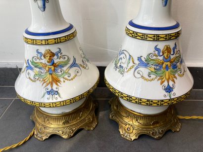 null Pair of white porcelain lamps with polychrome scrolls and masks, gilt bronze...