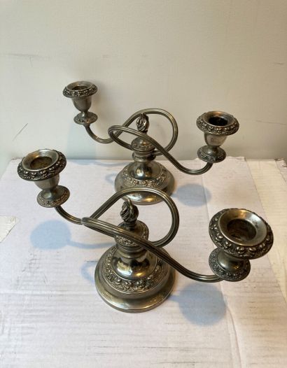 null England

Pair of silver plated candlesticks with two arms of light

Height 14...