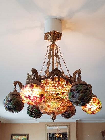 null A six-light gilt bronze basket chandelier made of coloured glass petals 

Height...